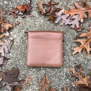 Im selling coach a palm organizer